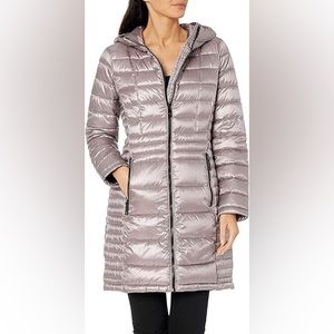Calvin Klein packable lightweight down. Light purple/lilac. Size small.